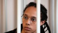 WNBA star and two-time Olympic gold medalist Brittney Griner sits in a cage at a court room prior to a hearing, in Khimki , outside Moscow, Russia, July 27, 2022. Alexander Zemlianichenko/Pool via REUTERS


