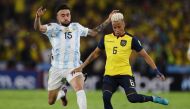 Ecuador's Byron Castillo in action with Argentina's Nicolas Gonzalez during the World Cup South American Qualifiers on  March 29, 2022. (REUTERS/Jose Jacome)
