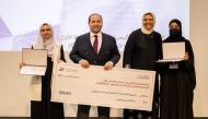 Dr. Hesham M Korashy, Professor of Pharmaceutical Sciences at College of Pharmacy at Qatar University, with the students.