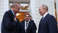 Russian President Vladimir Putin bids farewell to Turkish President Tayyip Erdogan after a meeting in Sochi, Russia, on August 5, 2022. (Sputnik/Vyacheslav Prokofyev/Pool via REUTERS)