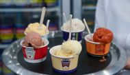 A worker presents favourite cult food brands-flavoured ice cream in a concept store by Anya Hindmarch at The Village, in London, Britain, August 4, 2022. Reuters/Maja Smiejkowska