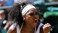 File Photo: Serena Williams reacts after winning the first set of Women's Final match against Garbine Muguruza of Spain at the Wimbledon Tennis Championships in London, July 11, 2015. (REUTERS/Suzanne Plunkett)