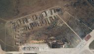 A satellite image shows destroyed Saky air base in Crimea, August 10, 2022. (Planet Labs PBC/Handout via REUTERS)
