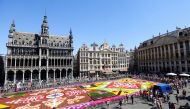 A view shows a 1,680 square meters flower carpet made with Belgian begonias, dahlias, grasses, barks and chrysanthemums at Brussels Grand Place, Belgium, August 12, 2022. (REUTERS/Johanna Geron)