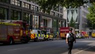 A police officer stands guard after closing the area near Waterloo due to a fire, in London, Britain, August 17, 2022. REUTERS/Maja Smiejkowska
