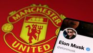 Elon Musk's twitter account and Manchester United logo are seen in this illustration taken, August 17, 2022. (REUTERS/Dado Ruvic)