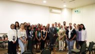 Nick Bradshaw, World Innovation Summit for Health’s (WISH) Director of Partnerships and Outreach (centre), with participating students at the meet.