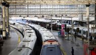 File Photo: A view of trains on the platform at Waterloo Station as a station worker stands nearby, on the first day of national rail strike in London, Britain, June 21, 2022. (REUTERS/Henry Nicholls)

