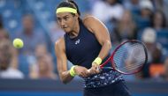 Caroline Garcia (FRA) returns a shot during her match against Jessica Pegula (USA) at the Western & Southern Open at the Lindner Family Tennis Center. Susan Mullane-USA Today Sports
 