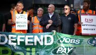 Mick Lynch, General Secretary of the National Union of Rail, Maritime and Transport Workers joins other union members on strike at a picket line outside Euston railway station in London, Britain, August 20, 2022. REUTERS/Henry Nicholls
