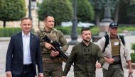 Ukraine's President Volodymyr Zelenskiy and Poland's President Andrzej Duda arrive for a joint news briefing in Kiev, on August 23, 2022. REUTERS/Viacheslav Ratynskyi