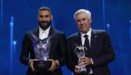 Real Madrid's Karim Benzema and coach Carlo Ancelotti pose with the men's player of the year award and the men's coach of the year award at the Halic Congress Center, Istanbul, Turkey, on August 25, 2022.  REUTERS/Murad Sezer