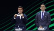 Vladimir Smicer draws Fiorentina as UEFA Head of Club Competitions & Calendar Tobias Hedtstuck looks on Reuters/Murad Sezer