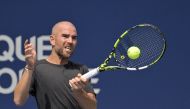 Adrian Mannarino (FRA) hits a forehand against Jannik Sinner (ITA) (not pictured) in second round play at IGA Stadium. Mandatory Credit: Eric Bolte-USA TODAY Sports

