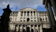 People walk past the Bank of England, in London, Britain, on October 31, 2021. REUTERS/Tom Nicholson/File Photo