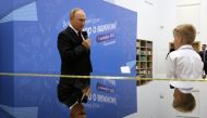 Russian President Vladimir Putin conducts an open lesson on Knowledge Day in Kaliningrad, Russia, September 1, 2022. (Sputnik/Gavriil Grigorov via Reuters)