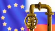 A model of the natural gas pipeline is seen in front of displayed word EU and Russia flag colours in this illustration taken on March 8, 2022. REUTERS/Dado Ruvic/Illustration