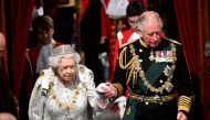 Britain's Queen Elizabeth arrives at the State Opening of Parliament with Charles, Prince of Wales, in London, on October 14, 2019.  File Photo/Reuters
