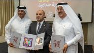 Officials during the launch of the stamps.