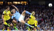 Manchester City's Erling Braut Haaland scores their second goal during the Group G Champions League match against Borussia Dortmund at the Etihad Stadium in Manchester on September 14, 2022.  Action Images via Reuters/Carl Recine
