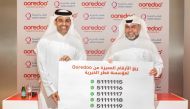 Deputy Group CEO and CEO of Ooredoo Qatar Sheikh Mohammed bin Abdulla Al Thani, and Qatar Charity CEO Yousef Ahmed Al Kuwari at yesterday's event.