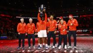 Team World's Frances Tiafoe celebrates with the trophy after winning the Laver Cup at the 02 Arena in London on September 25, 2022.   Action Images via Reuters/Andrew Boyers