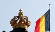 The Belgian flag is seen outside Brussels Royal Palace during negotiations to form a government, in Brussels on September 21, 2020.  File Photo / Reuters
