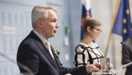 Finnish Foreign Minister Pekka Haavisto and Interior Minister Krista Mikkonen address a news conference on the government's resolution regarding the right of Russian citizens to enter Finland as tourists, in Helsinki, Finland September 29, 2022. Roni Rekomaa/Lehtikuva/via REUTERS