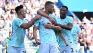 Inter Milan's Edin Džeko celebrates with teammates after scoring a goal against Sassuolo during their Serie A match at the Stadio Mapei - Citta del Tricolore in Reggio Emilia, Italy, on Saturday.