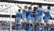 Manchester City players celebrate scoring their fourth goal against Southampton at the Etihad Stadium in Manchester on October 8, 2022.  Action Images via Reuters/Jason Cairnduff 
