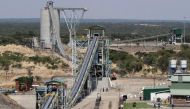  Employees walk under a concentrator at Ngezi platinum processing plant near Harare on November 28, 2013. File Photo / Reuters
