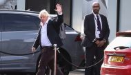 Former British Prime Minister Boris Johnson gestures, at Gatwick Airport, near London, Britain October 22, 2022. REUTERS/Henry Nicholls