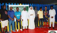 Ambassador of Nigeria to Qatar, H E Yakubu Abdullahi Ahmed (fourth left), Walking Football Qatar President Farhan Al Sheikh Al Sayed (centre), NIDO-Qatar President Ajibade Lateef (fourth right), Farouk Wase (first right) with the winning team captain and other officials during the event. 