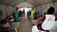 Health workers and patients are seen inside a cholera treatment tent for severe cases at the Medecins Sans Frontieres (MSF - Doctors without Borders) Cholera Treatment Center, in Maiduguri, Borno State, Nigeria October 18, 2022. REUTERS/Christophe Van Der Perre