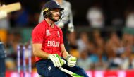 England's Captain Jos Buttler reacts after his dismissal during the ICC men's Twenty20 World Cup 2022 cricket match between England and New Zealand at The Gabba on November 1, 2022 in Brisbane. Photo by Patrick Hamilton / AFP