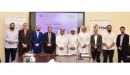 QU Vice-President for Academic Affairs Dr. Omar Al Ansari (fifth left) and Traffic Tech (Gulf) Group Chief Executive Officer Eng Abdel Rahman Al Khateeb (fourth left) along with officials from the two sides during the signing of the agreement.