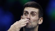 Serbia's Novak Djokovic celebrates after winning his group stage match against Russia's Andrey Rublev at the ATP Finals Turin in Turin, Italy, November 16, 2022. (REUTERS/Guglielmo Mangiapane)