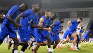 France’s forward Kylian Mbappe and teammates take part in a training session at the Jassim Bin Hamad Stadium in Doha.