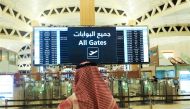 File photo: A man checks the flight timings at the King Khalid International Airport in Riyadh, Saudi Arabia, May 16, 2021. (REUTERS/Ahmed Yosri)