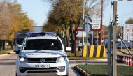 A police vehicle exits the Torrejon de Ardoz Air Force Base after suspected explosive devices hidden in envelopes were mailed to the base. Reuters/Violeta Santos Moura
 