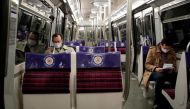 File photo: People wearing protective face masks ride the metro in a rush hour in Paris, during the outbreak of the coronavirus disease in France, May 11, 2020. (REUTERS/Benoit Tessier)