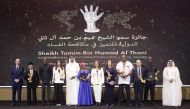 Amir H H Sheikh Tamim bin Hamad Al Thani with the winners of His Highness’s Sheikh Tamim Bin Hamad Al Thani International Anti-Corruption Excellence Awards and other officials at the award function yesterday.
