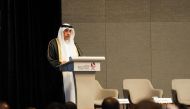 Minister of Labour H E Dr. Ali bin Smaikh Al Marri speaking at the symposium in Singapore. 