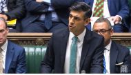 A video grab from footage broadcast by the UK Parliament's Parliamentary Recording Unit (PRU) shows Britain's Prime Minister Rishi Sunak addressing the MPs on illegal immigration at the House of Commons, in London, on December 13, 2022. (Photo by PRU / AFP) 