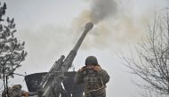 Ukrainian service members fire a shell from a howitzer at a front line, as Russia's attack on Ukraine continues, in Zaporizhzhia Region, Ukraine, December 16, 2022. (REUTERS)