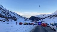 In this Handout photo made available by Lech Zuers Tourismus shows members of the emergency services working near the scene of an avalanche at Bregenz, Austria on December 25, 2022 - A 
