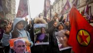 Members of the Kurdish community attend a march organised by the Kurdish Democratic Council in France (CDK-F) in tribute to the victims of Friday's deadly attack, in Paris, France, on December 26, 2022. REUTERS/Sarah Meyssonnier