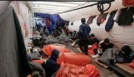 Migrants sleep on deck of NGO rescue ship 'Ocean Viking', in the Mediterranean Sea, on November 6, 2022. File Photo / Reuters
