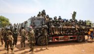 Soldiers of the South Sudan People's Defence Forces (SSPDF) prepare to be deployed to the Democratic Republic of Congo (DRC) after their departure ceremony at the SSPDF Headquarters in Juba on December 28, 2022. (Photo by Samir Bol / AFP)