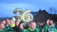 Crowds cheered on Gary McKee (centre) as he completed his 365th marathon of the year (Photo: Marathon Man 365 / Elwyn L Evans /Facebook)